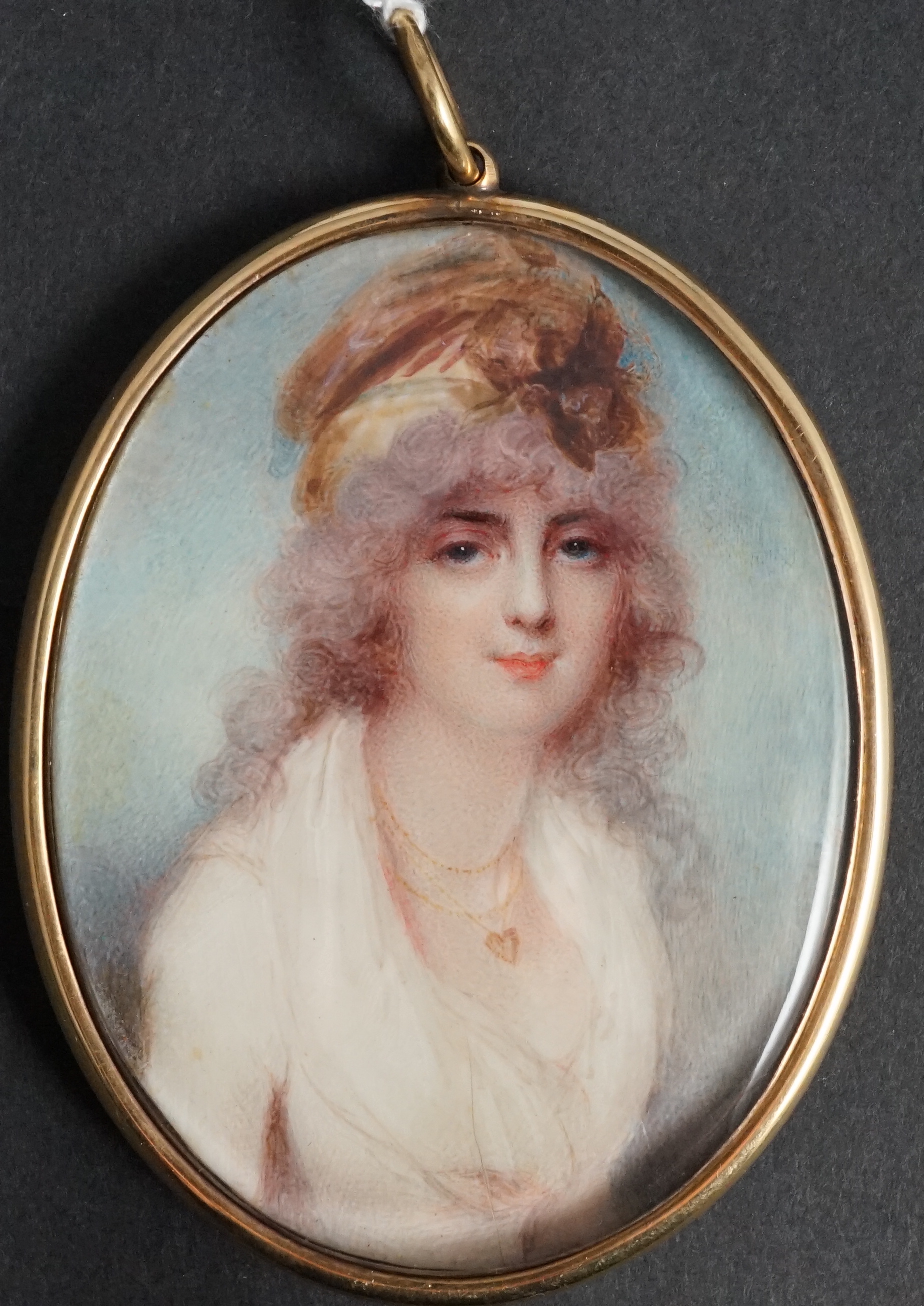 Mrs Anne Mee, née Foldsone (British, 1775-1851), Portrait miniature of a lady wearing a white dress and gold chain with a heart shaped locket, watercolour on ivory, 7.6 x 5.8cm. CITES Submission reference HQJ8KNQ9